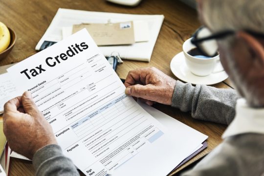 Tax Credits Claim Return Deduction Refund Concept
